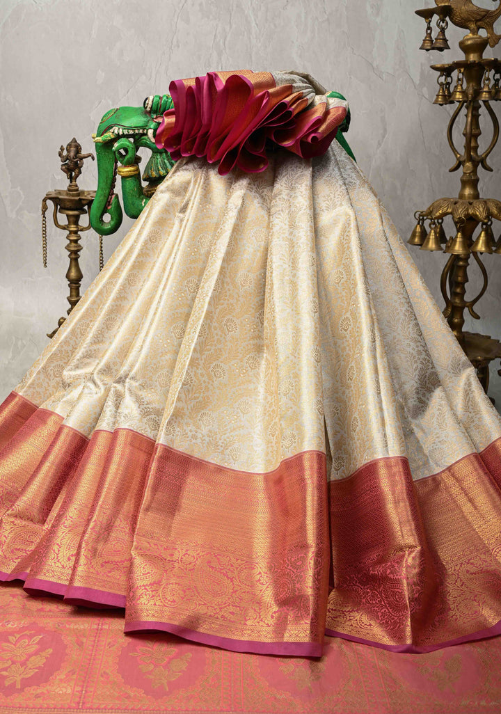 Pearl White Kanjivaram Tissue Semi Silk Saree with Floral Brocade Jaal and Contrast Zari Border
