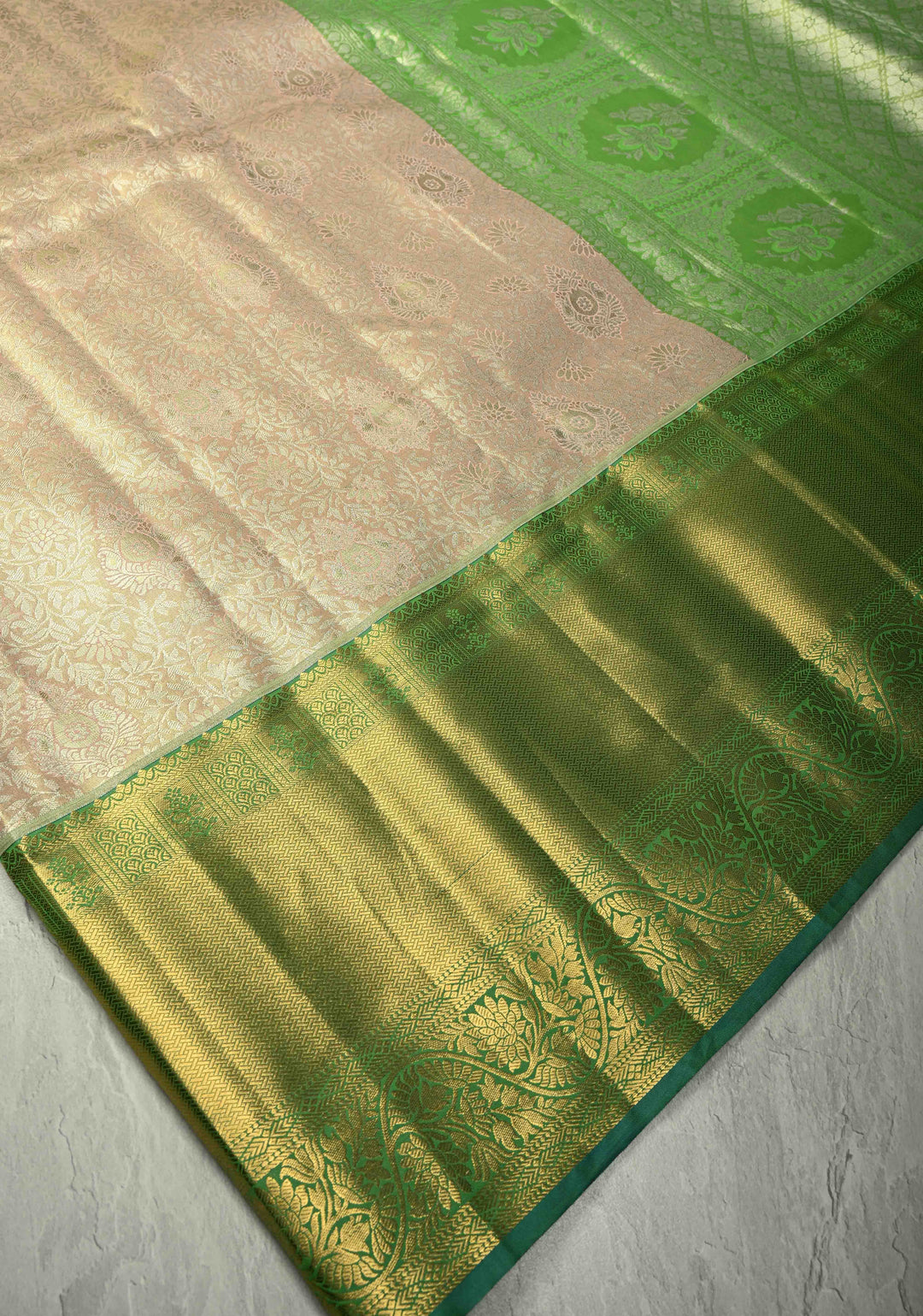Light Peach Kanjivaram Tissue Semi Silk Saree with Meenakari Floral Brocade Jaal and Contrast Wide Zari Border