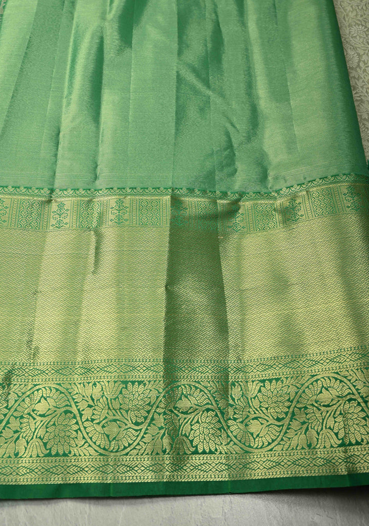 Sage Green Kanjivaram Tissue Semi Silk Saree with Floral Brocade Jaal and Contrast Wide Zari Border