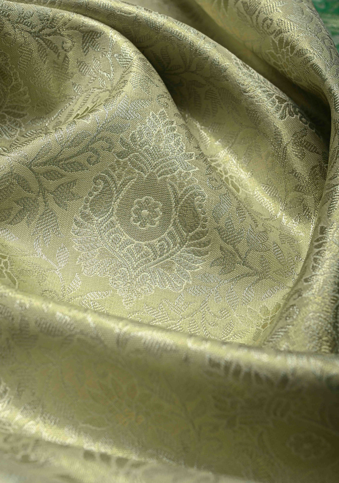 Sage Green Kanjivaram Tissue Semi Silk Saree with Floral Brocade Jaal and Contrast Wide Zari Border
