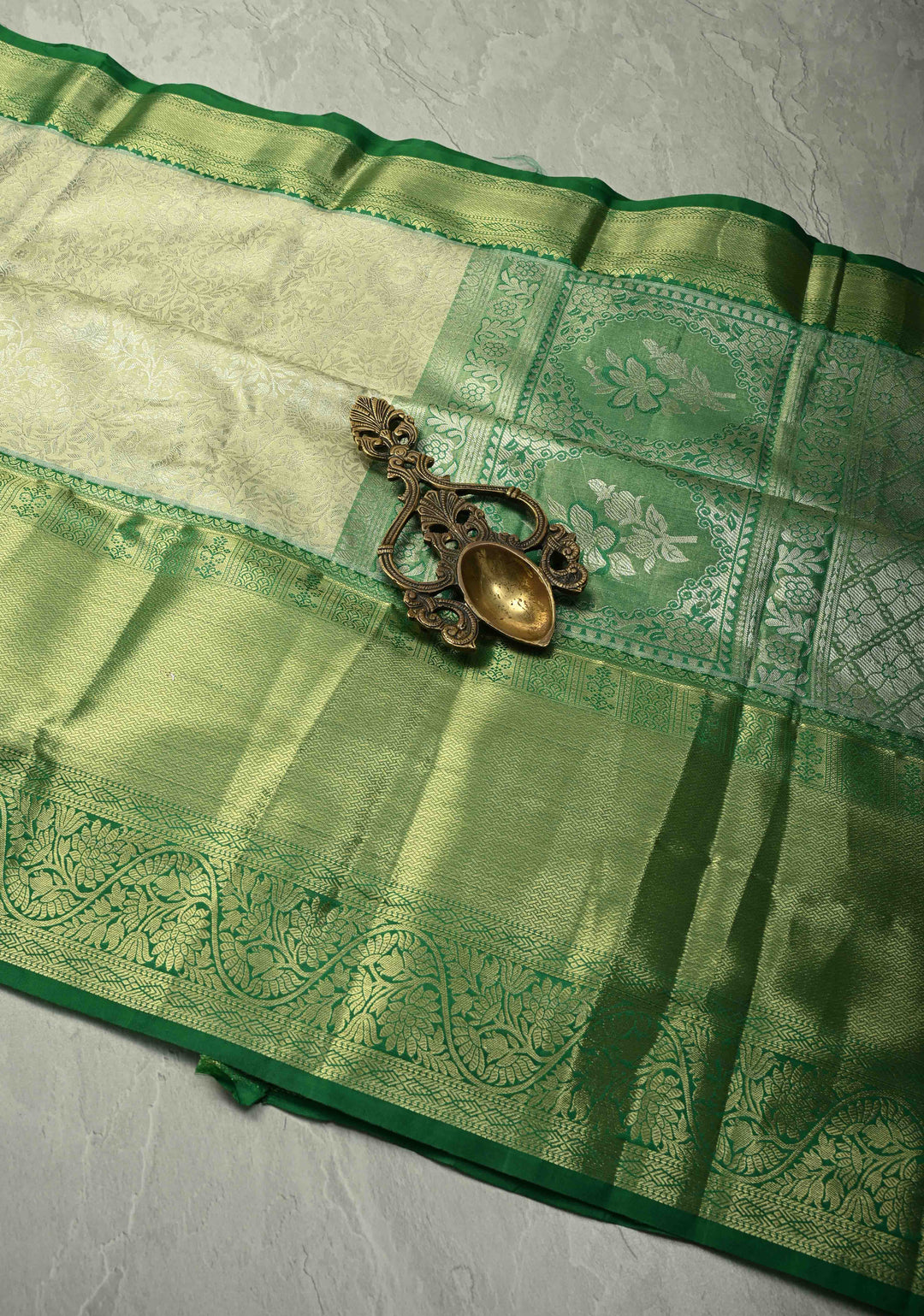 Sage Green Kanjivaram Tissue Semi Silk Saree with Floral Brocade Jaal and Contrast Wide Zari Border