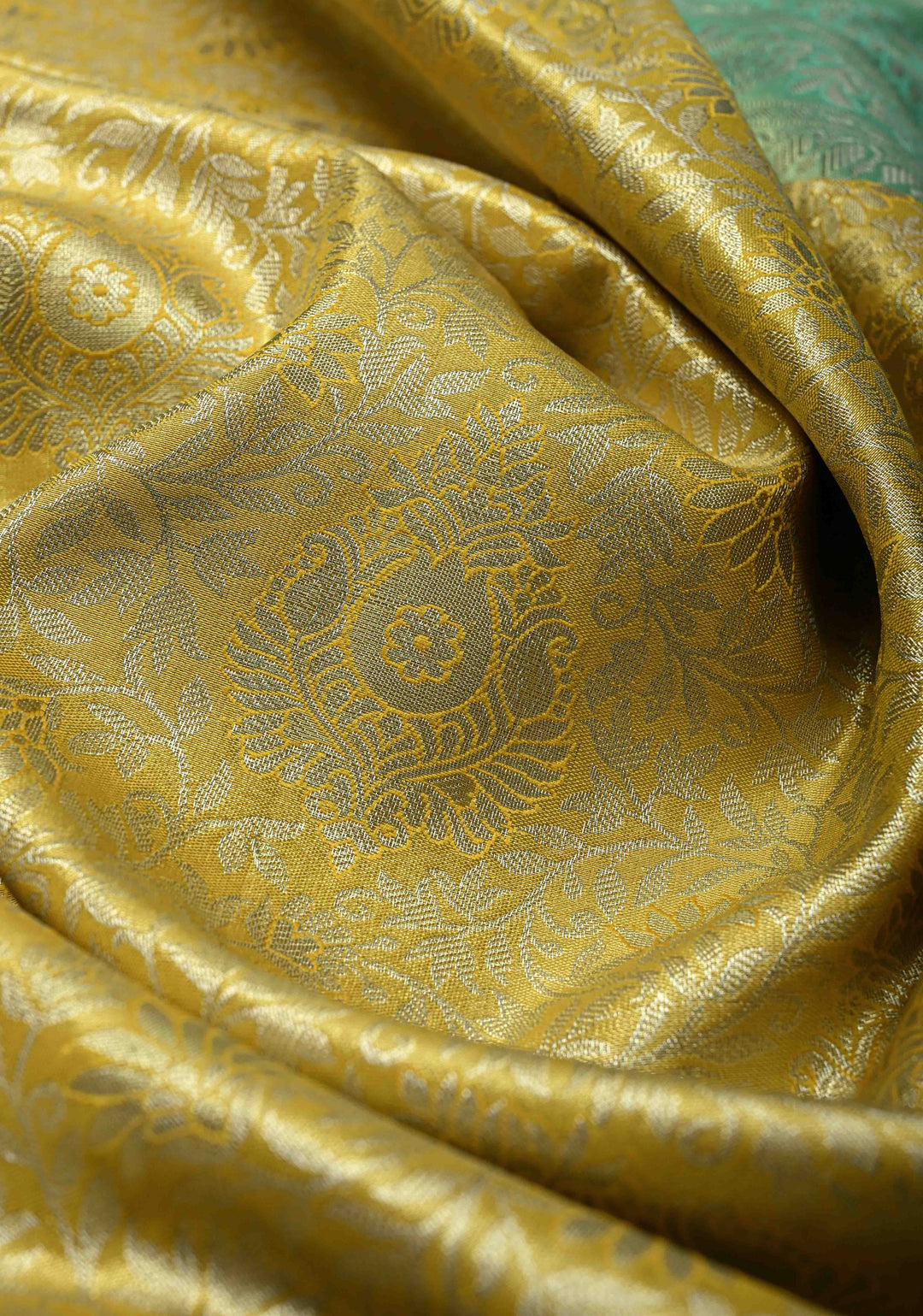 Exquisite Yellow Kanjivaram Tissue Semi Silk Saree with Floral Brocade Jaal and Contrast Wide Zari Border