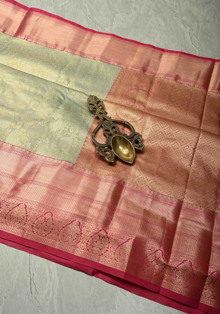 Light Sage Green Kanjivaram Tissue Semi Silk Saree with Meenakari Floral Brocade Jaal and Contrast Wide Zari Border