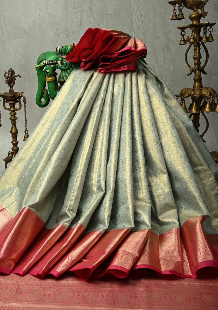 Light Sage Green Kanjivaram Tissue Semi Silk Saree with Meenakari Floral Brocade Jaal and Contrast Wide Zari Border