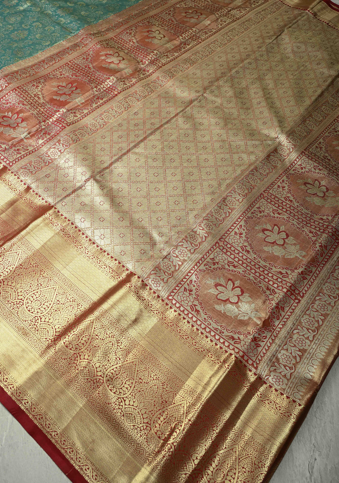 Sea Green Kanjivaram Tissue Semi Silk Saree with Meenakari Floral Brocade Jaal and Contrast Wide Zari Border