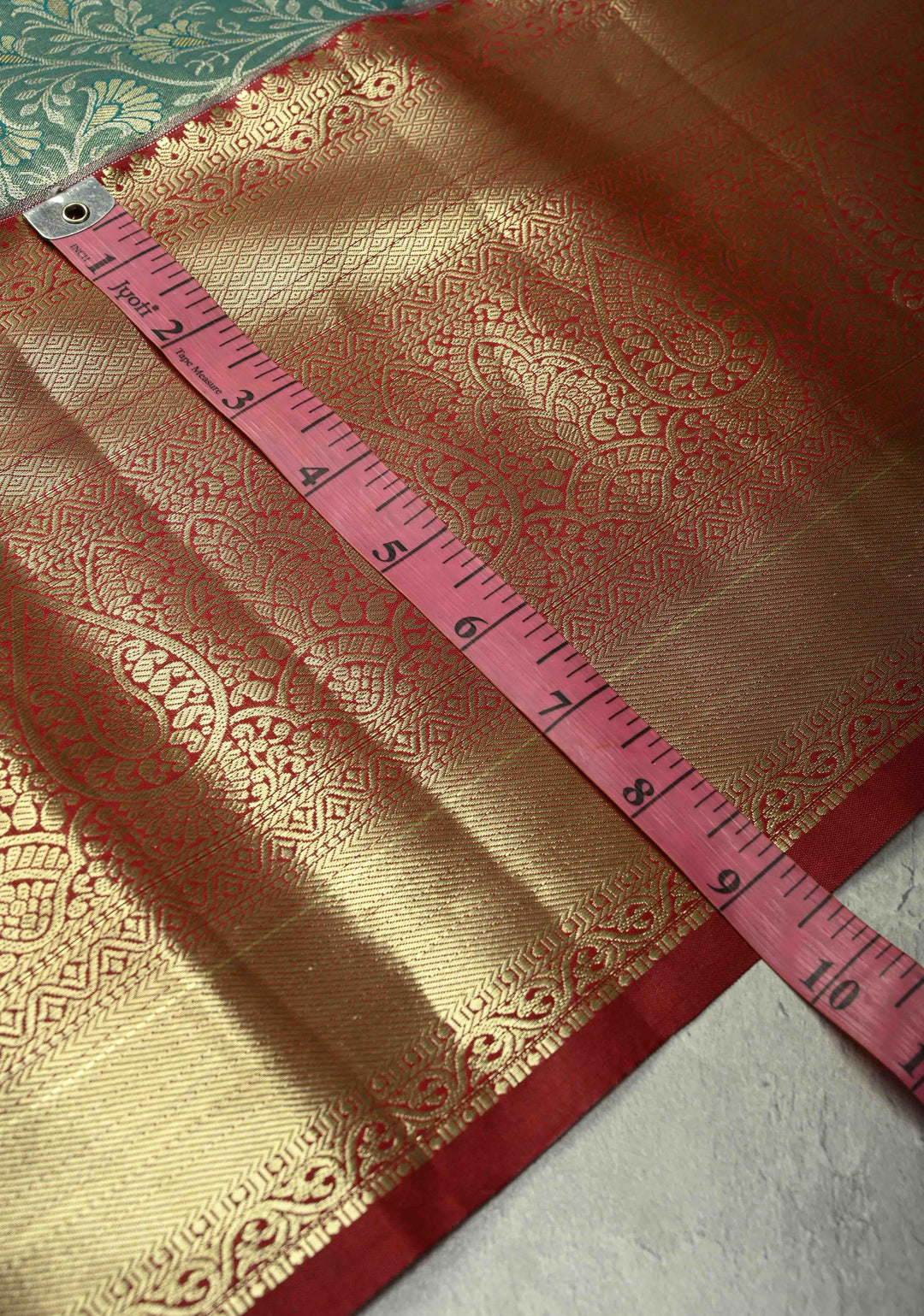 Sea Green Kanjivaram Tissue Semi Silk Saree with Meenakari Floral Brocade Jaal and Contrast Wide Zari Border