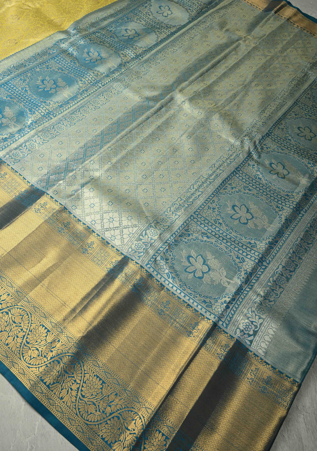 Butter Yellow Kanjivaram Tissue Semi Silk Saree with Meenakari Floral Brocade Jaal and Blue Zari Border