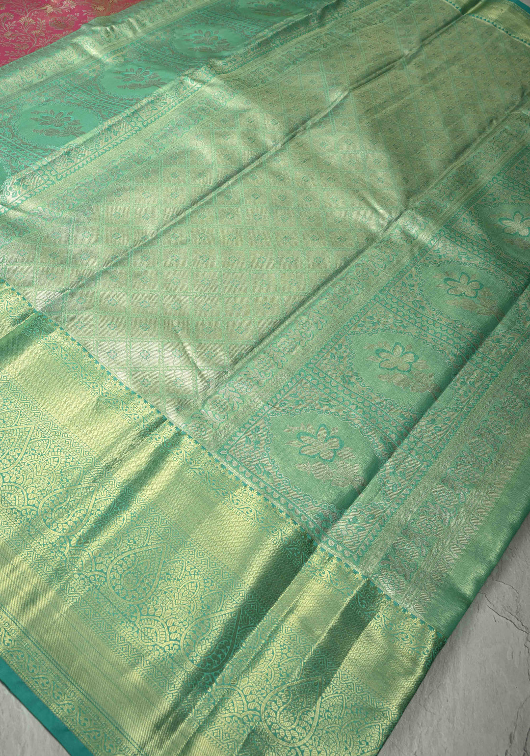 Coral Pink Kanjivaram Tissue Semi Silk Saree with Meenakari Floral Brocade Jaal and Contrast Wide Zari Border