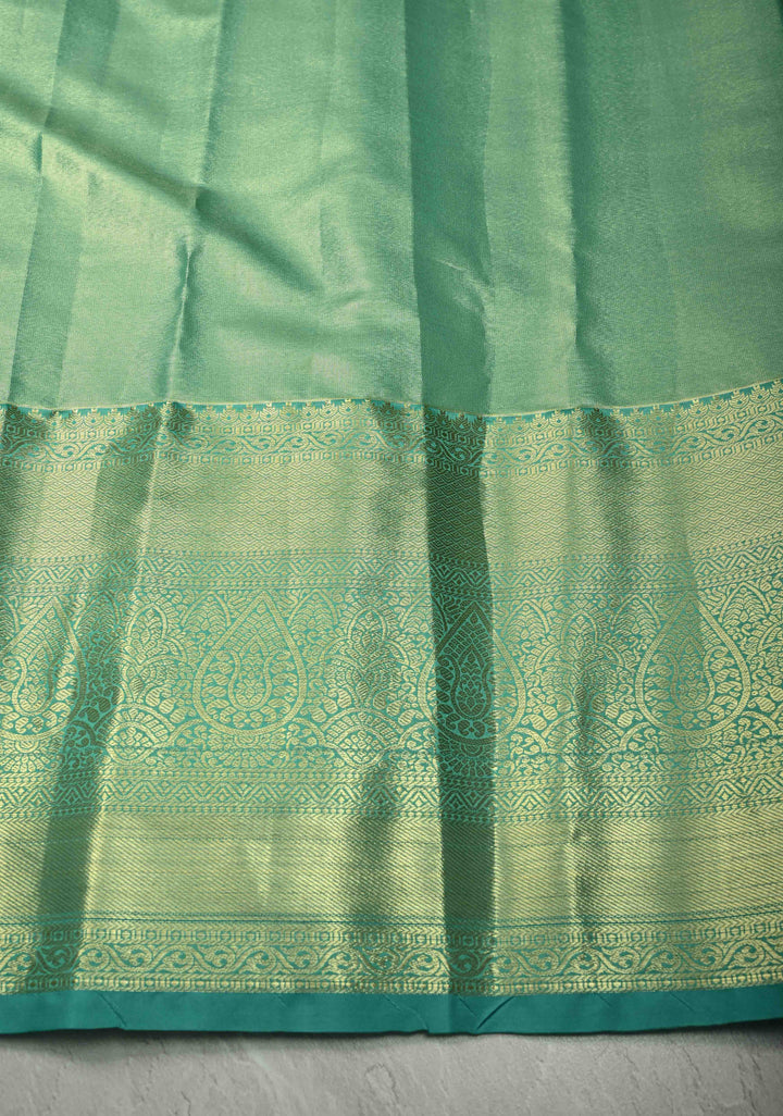 Coral Pink Kanjivaram Tissue Semi Silk Saree with Meenakari Floral Brocade Jaal and Contrast Wide Zari Border