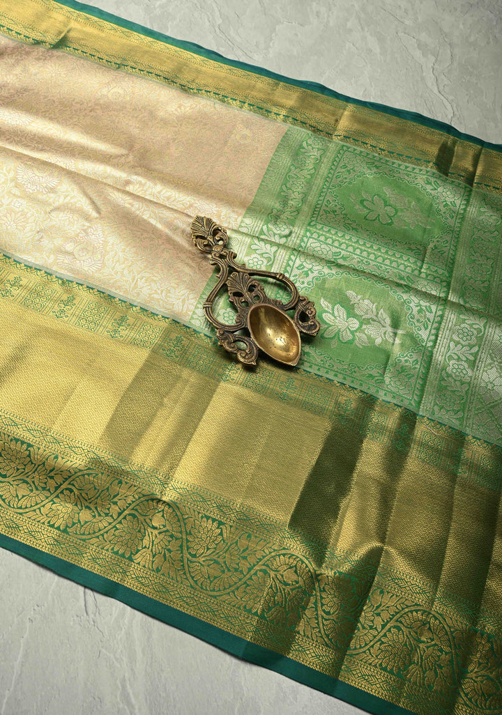 Light Peach Kanjivaram Tissue Semi Silk Saree with Meenakari Floral Brocade Jaal and Contrast Wide Zari Border