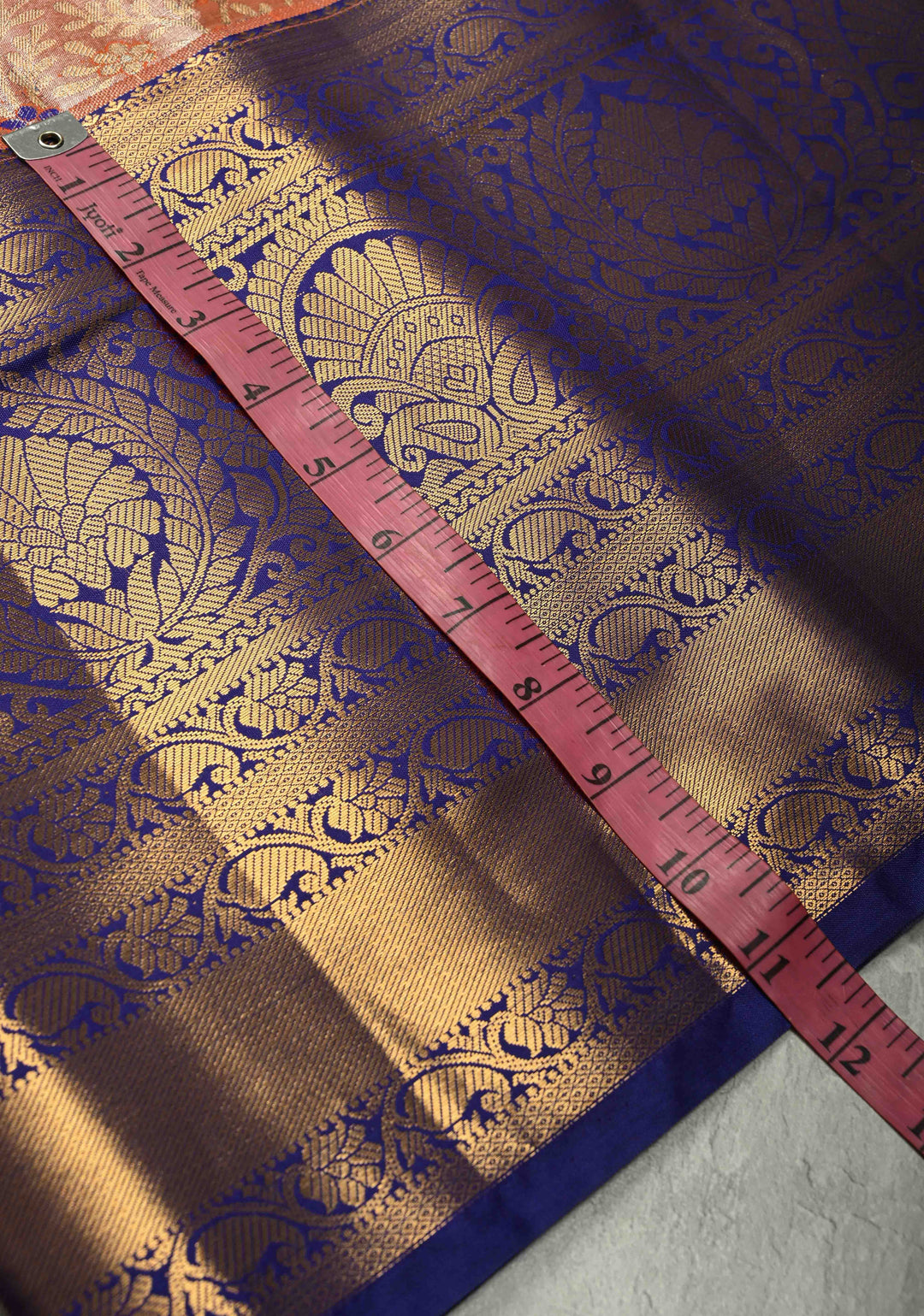 Orange  Kanjivaram Tissue Semi Silk Saree with Meenakari Floral Brocade Jaal and Contrast Wide Zari Border