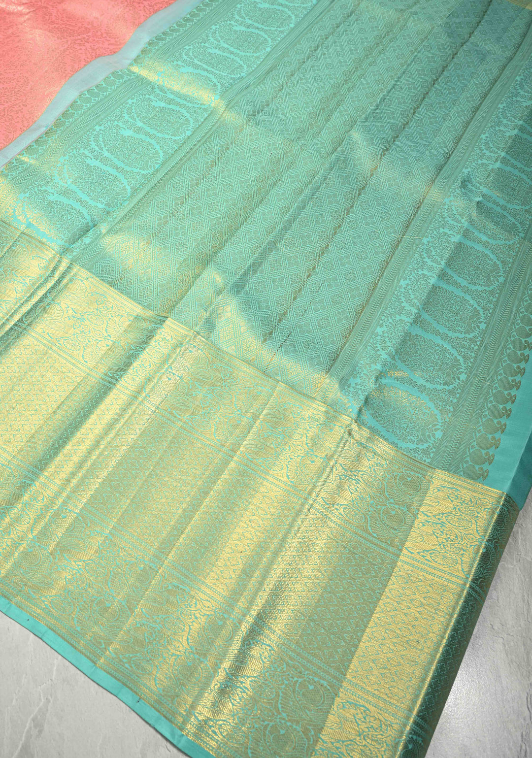 Salmon Pink Kanjivaram Pure Silk Saree with Silver Floral Jaal and Contrast Wide Zari Border | SILK MARK CERTIFIED | SHOBITAM