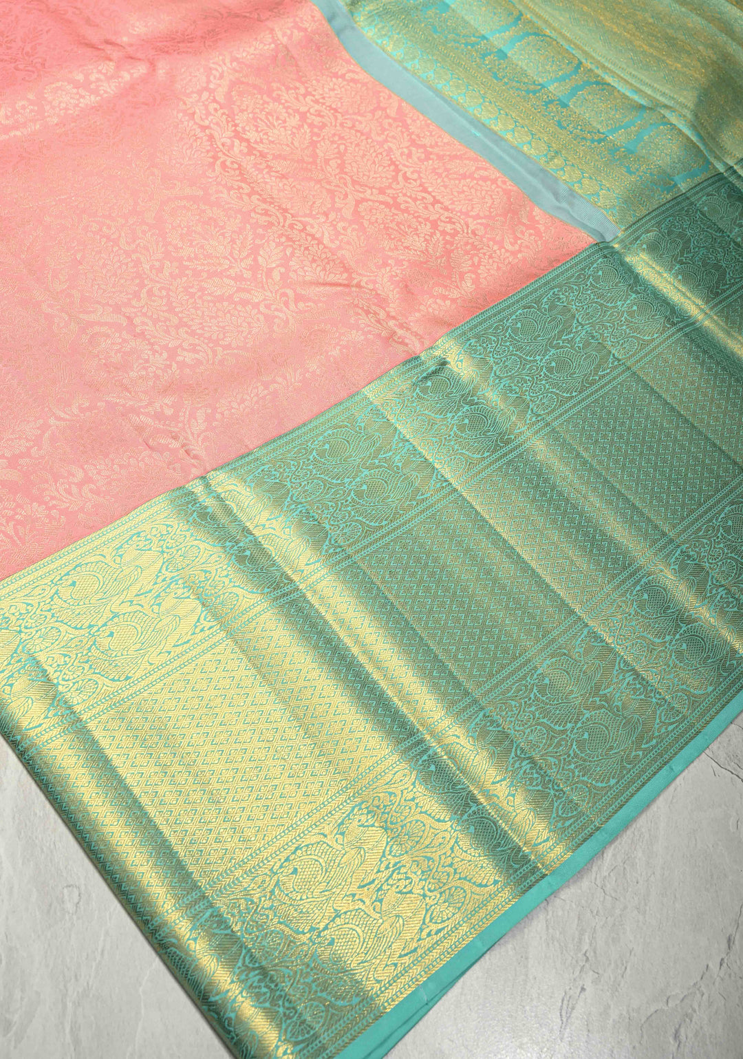 Salmon Pink Kanjivaram Pure Silk Saree with Silver Floral Jaal and Contrast Wide Zari Border | SILK MARK CERTIFIED | SHOBITAM