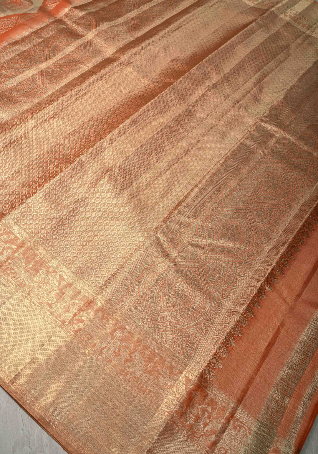 Peach Pure Kanjivaram Tissue Silk Saree with Geometric Brocade and Procession Zari Border | SILK MARK CERTIFIED