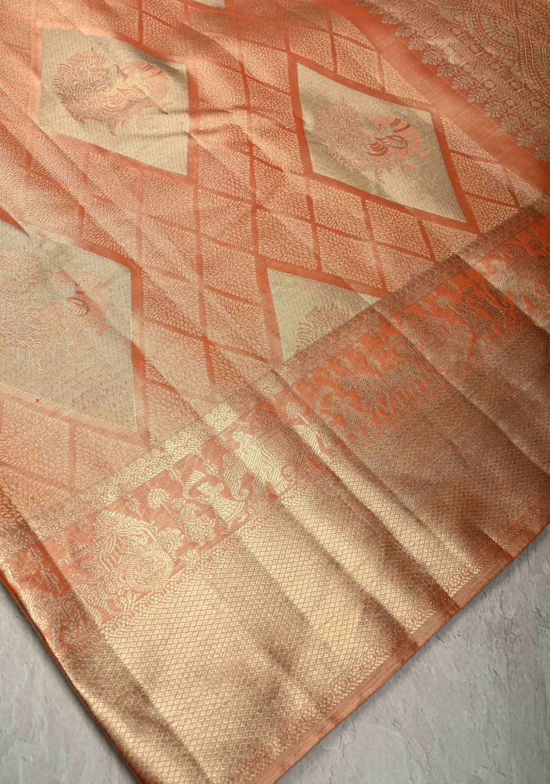 Peach Pure Kanjivaram Tissue Silk Saree with Geometric Brocade and Procession Zari Border | SILK MARK CERTIFIED