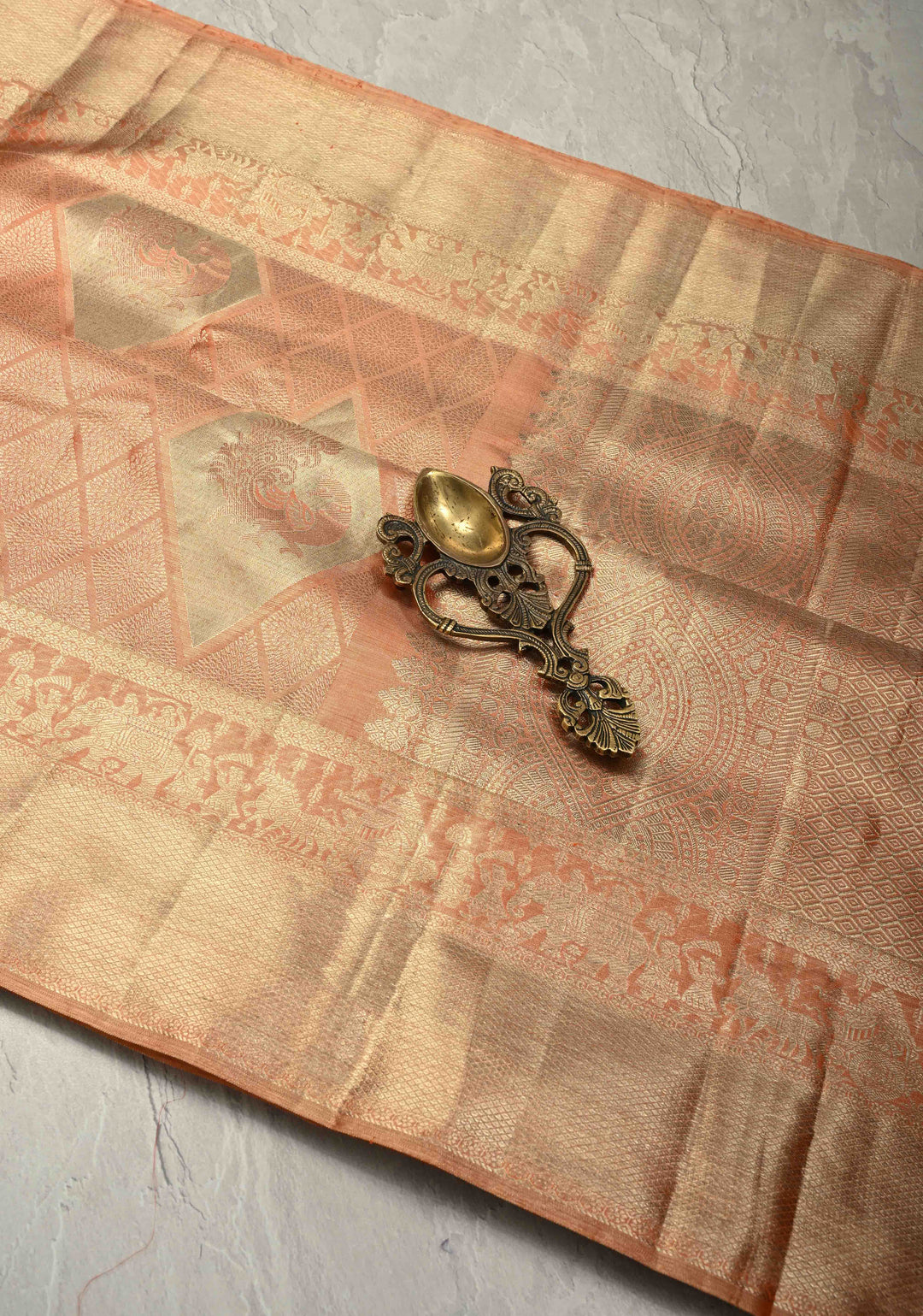 Peach Pure Kanjivaram Tissue Silk Saree with Geometric Brocade and Procession Zari Border | SILK MARK CERTIFIED
