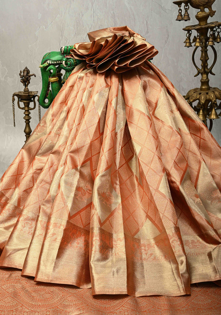 Peach Pure Kanjivaram Tissue Silk Saree with Geometric Brocade and Procession Zari Border | SILK MARK CERTIFIED