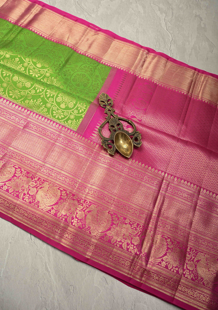 Parrot Green Pure Kanjivaram Silk Saree with Floral Brocade Jaal and Contrast Wide Zari Border | SILK MARK CERTIFIED