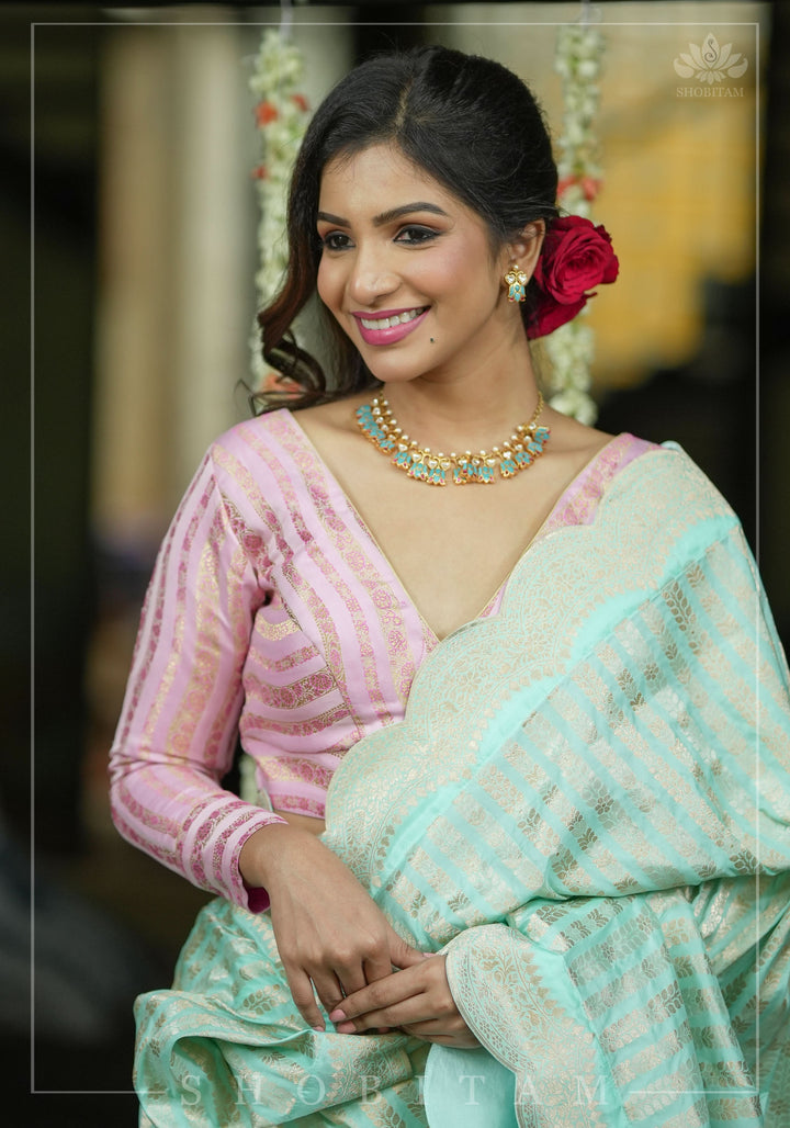 Thistle Banarasi brocade Stripes plunge neck blouse with full sleeves and Lakshmi jewel detailing, Made to Order