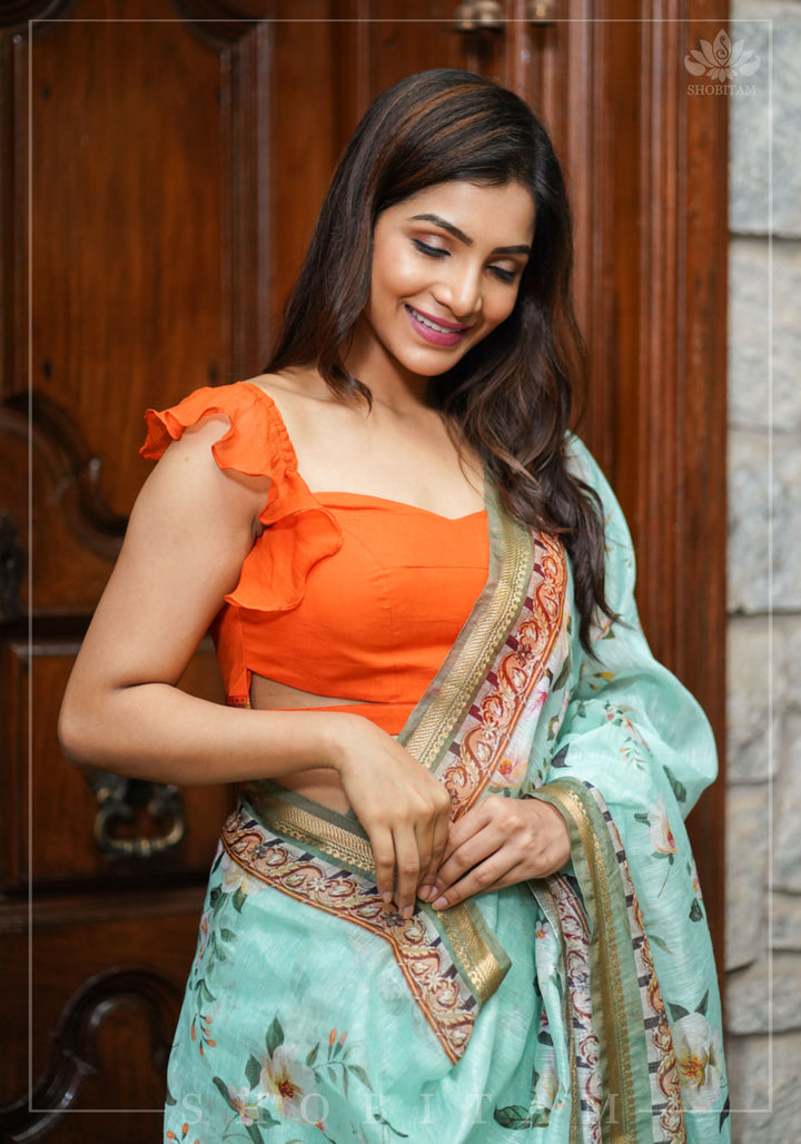 Orange chiffon sweetheart neck blouse with ruffle sleeves