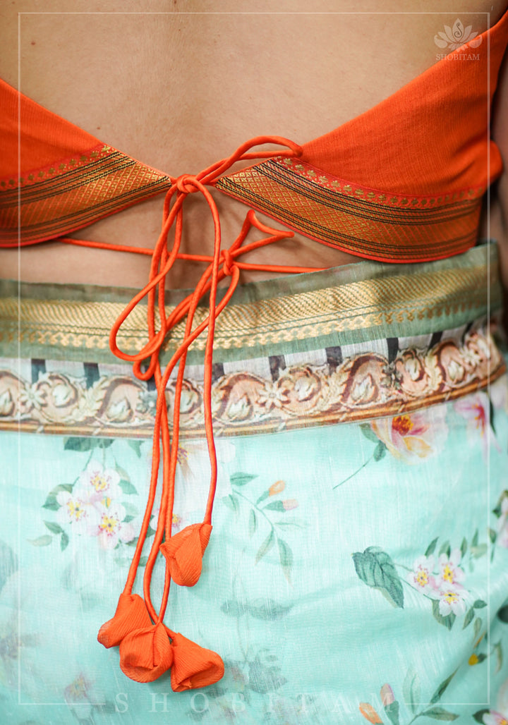 Orange chiffon sweetheart neck blouse with ruffle sleeves