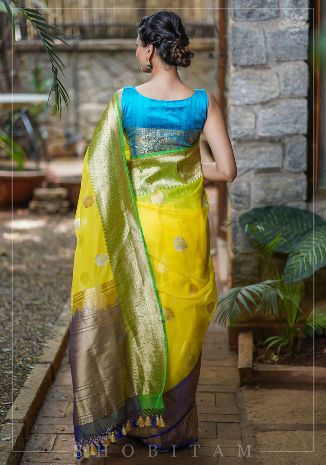 Pure Raw Silk Sleeveless blouse in Blue Green with Wide Kanchi Border detailing in back