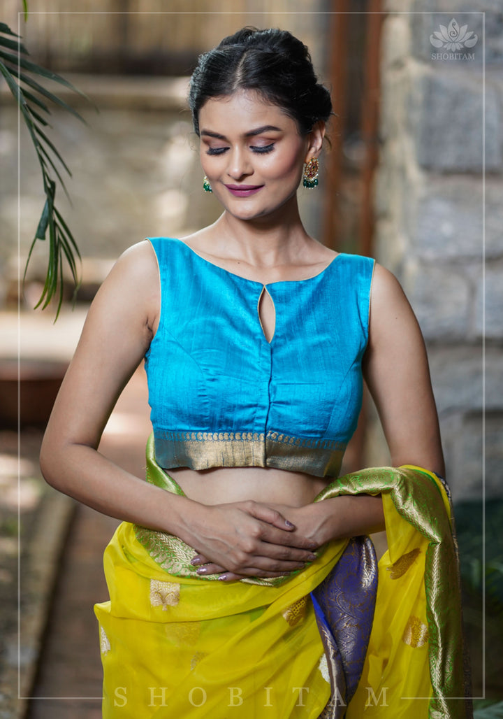 Pure Raw Silk Sleeveless blouse in Blue Green with Wide Kanchi Border detailing in back