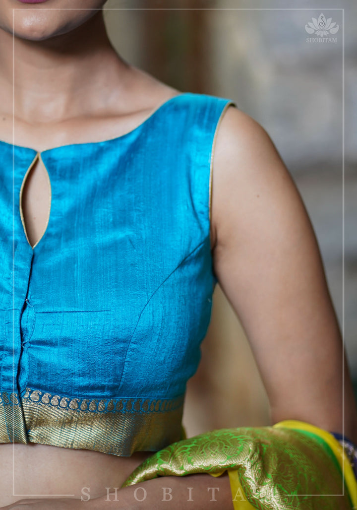 Pure Raw Silk Sleeveless blouse in Blue Green with Wide Kanchi Border detailing in back