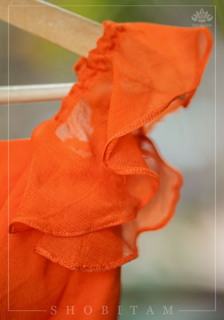 Orange chiffon sweetheart neck blouse with ruffle sleeves