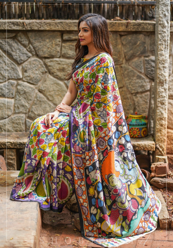 Hand Kalamkari on Chennuri silk with florals and Radha Krishna Pallu