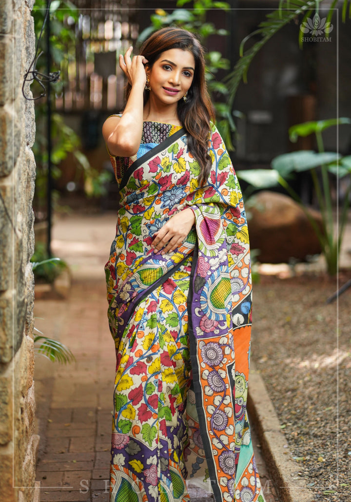 Hand Kalamkari on Chennuri silk with florals and Radha Krishna Pallu