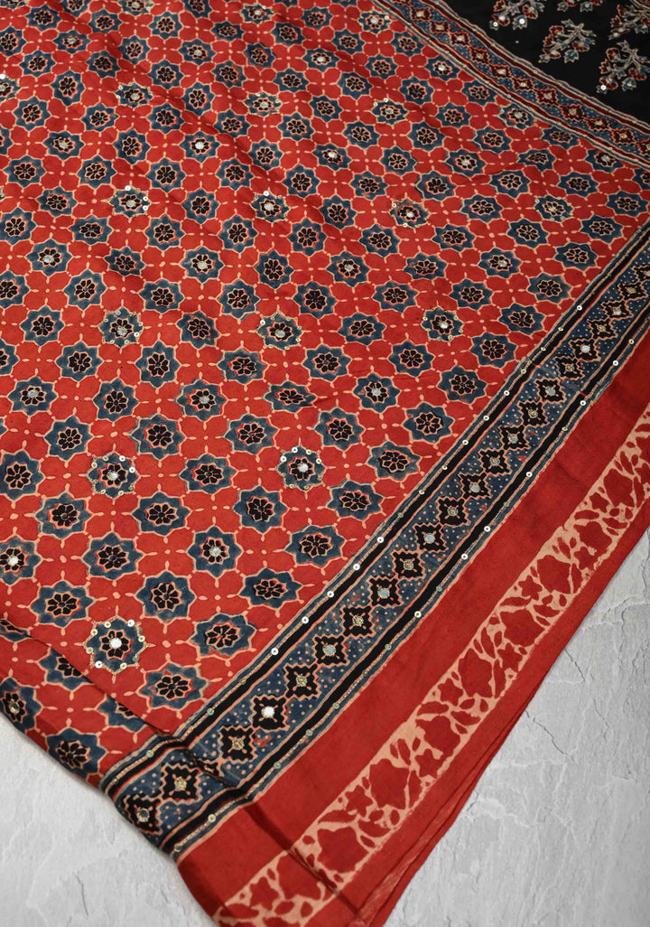 Brick Red Modal Silk Saree with Ajrakh Hand Block Print and mirror, sequins aari work