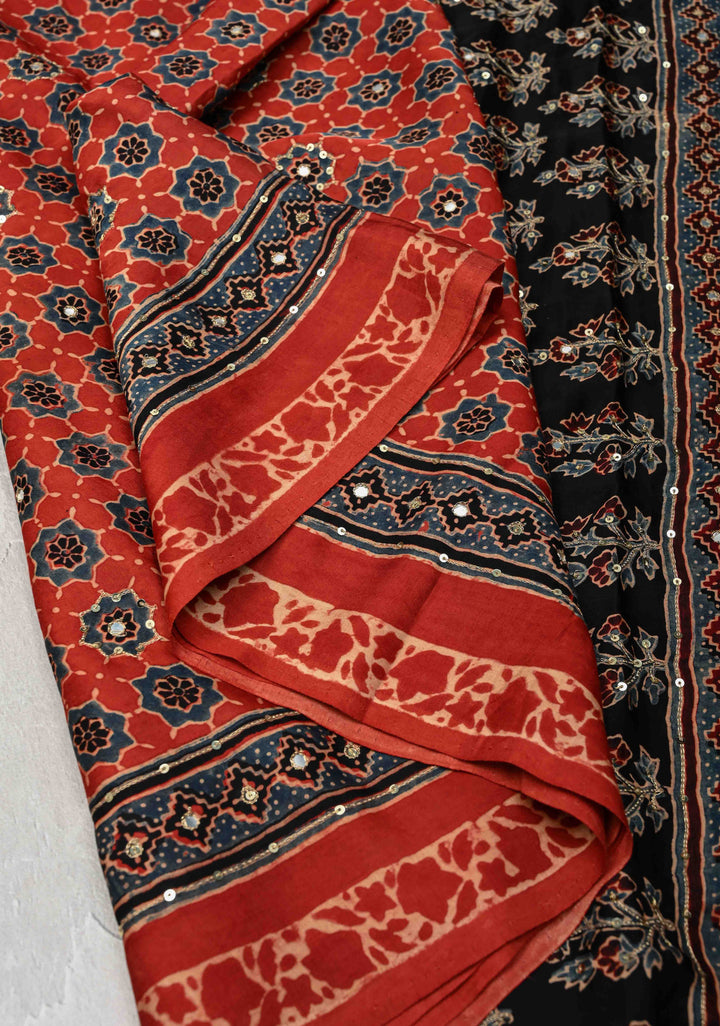Brick Red Modal Silk Saree with Ajrakh Hand Block Print and mirror, sequins aari work