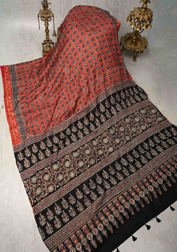 Ajrakh Hand Block Printed in Brick Red Modal Silk Saree with Aari and Mirror Work