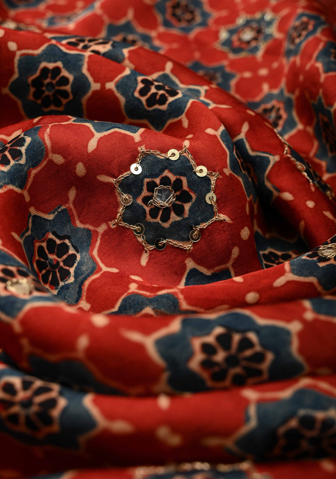 Ajrakh Hand Block Printed in Brick Red Modal Silk Saree with Aari and Mirror Work