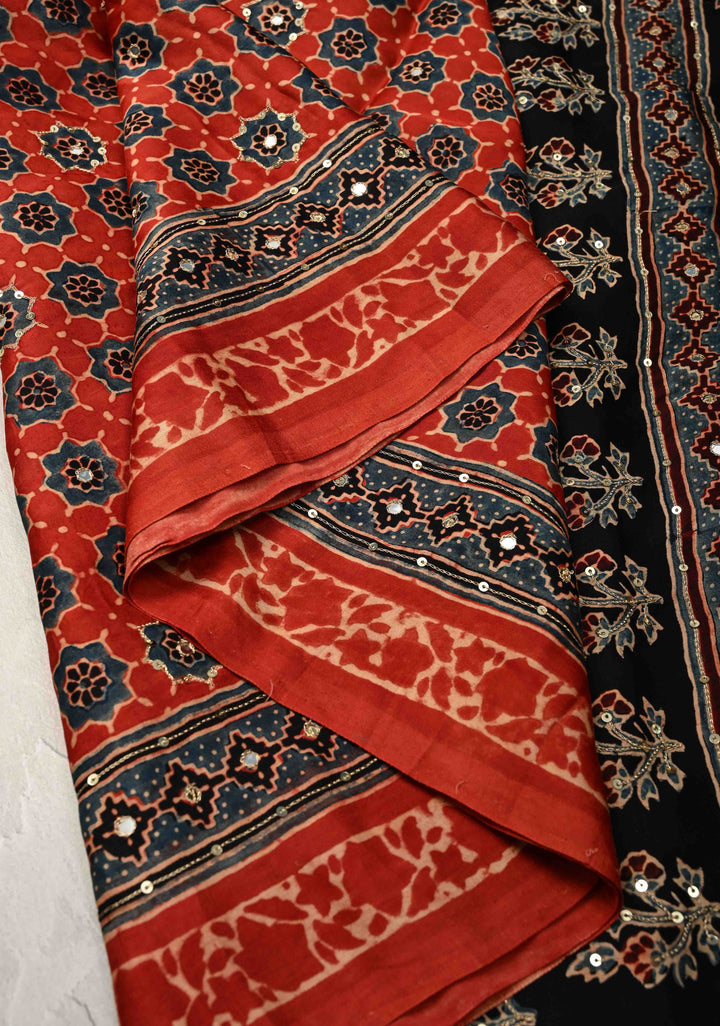 Ajrakh Hand Block Printed in Brick Red Modal Silk Saree with Aari and Mirror Work