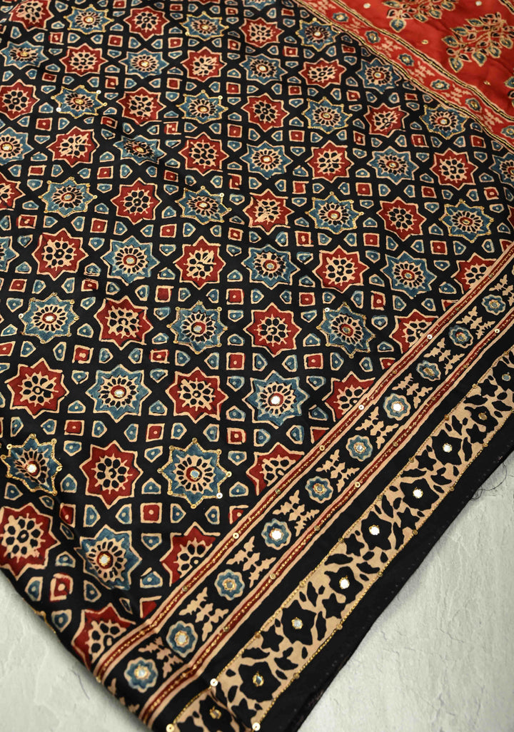 Stunning Black Ajrakh Hand Block Print on Modal Silk Saree with Aari-Mirror Work and Red Pallu