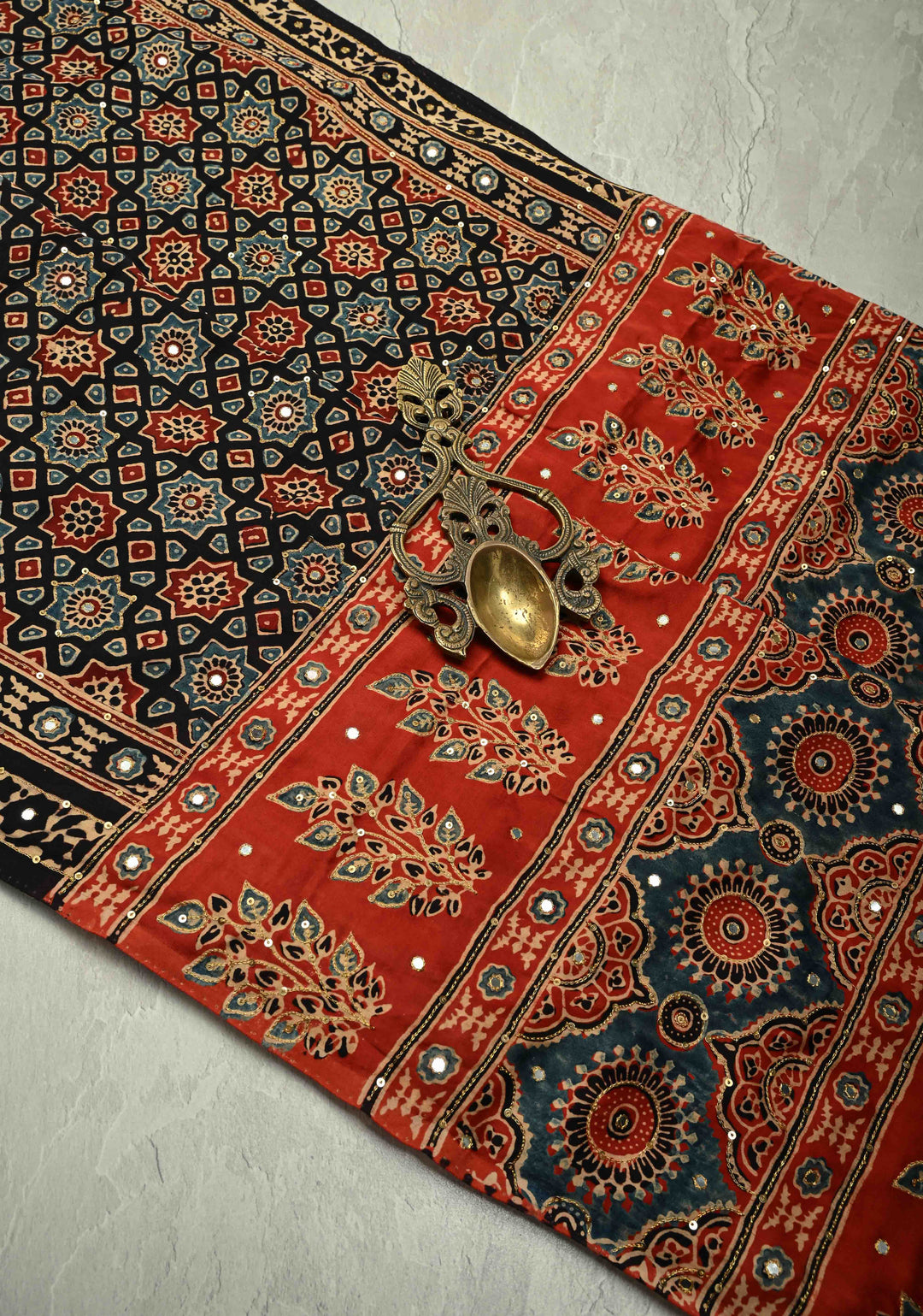 Stunning Black Ajrakh Hand Block Print on Modal Silk Saree with Aari-Mirror Work and Red Pallu