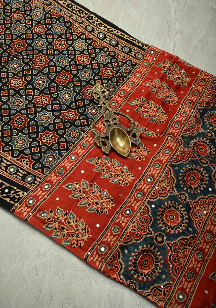 Stunning Black Ajrakh Hand Block Print on Modal Silk Saree with Aari-Mirror Work and Red Pallu