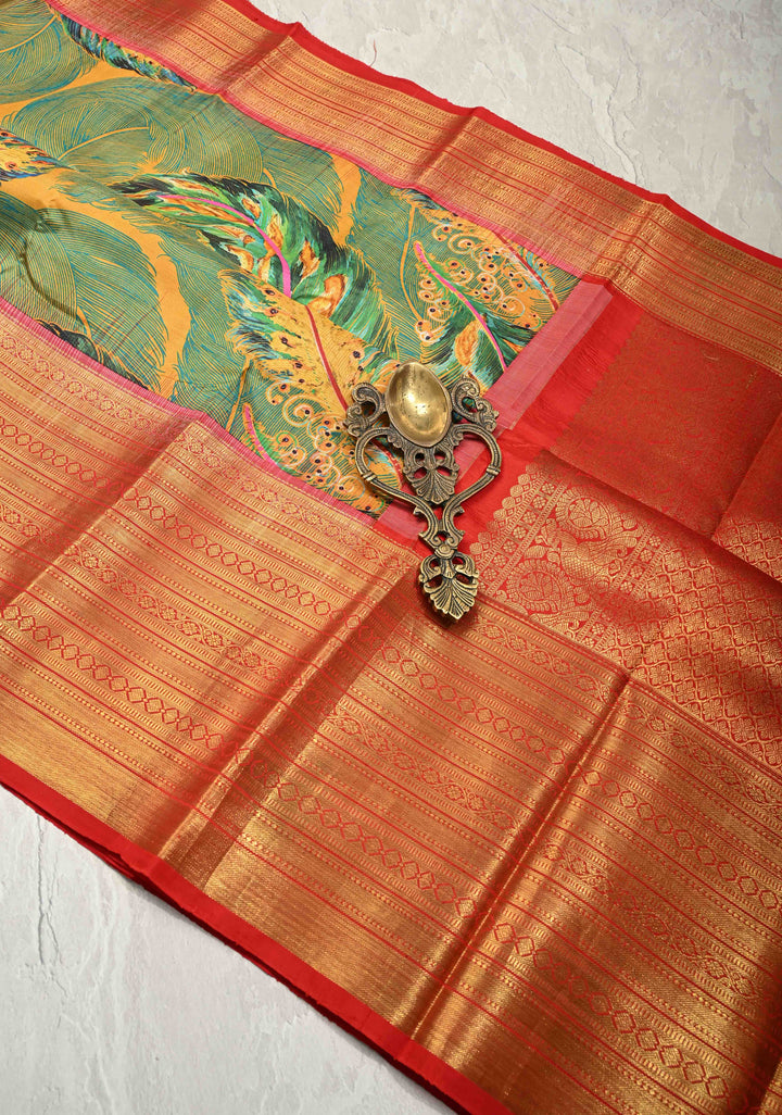 Green-Mustard Pure Kanjivaram Silk Saree with Peacock Feathers Abstract Digital Print and Contrast Wide Zari Border | SILK MARK CERTIFIED