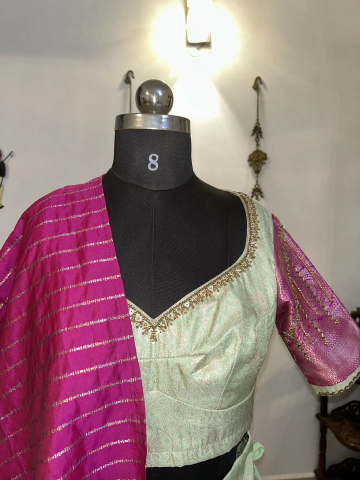 Yuvathi Mint green silk half Saree lehenga set with aari work
