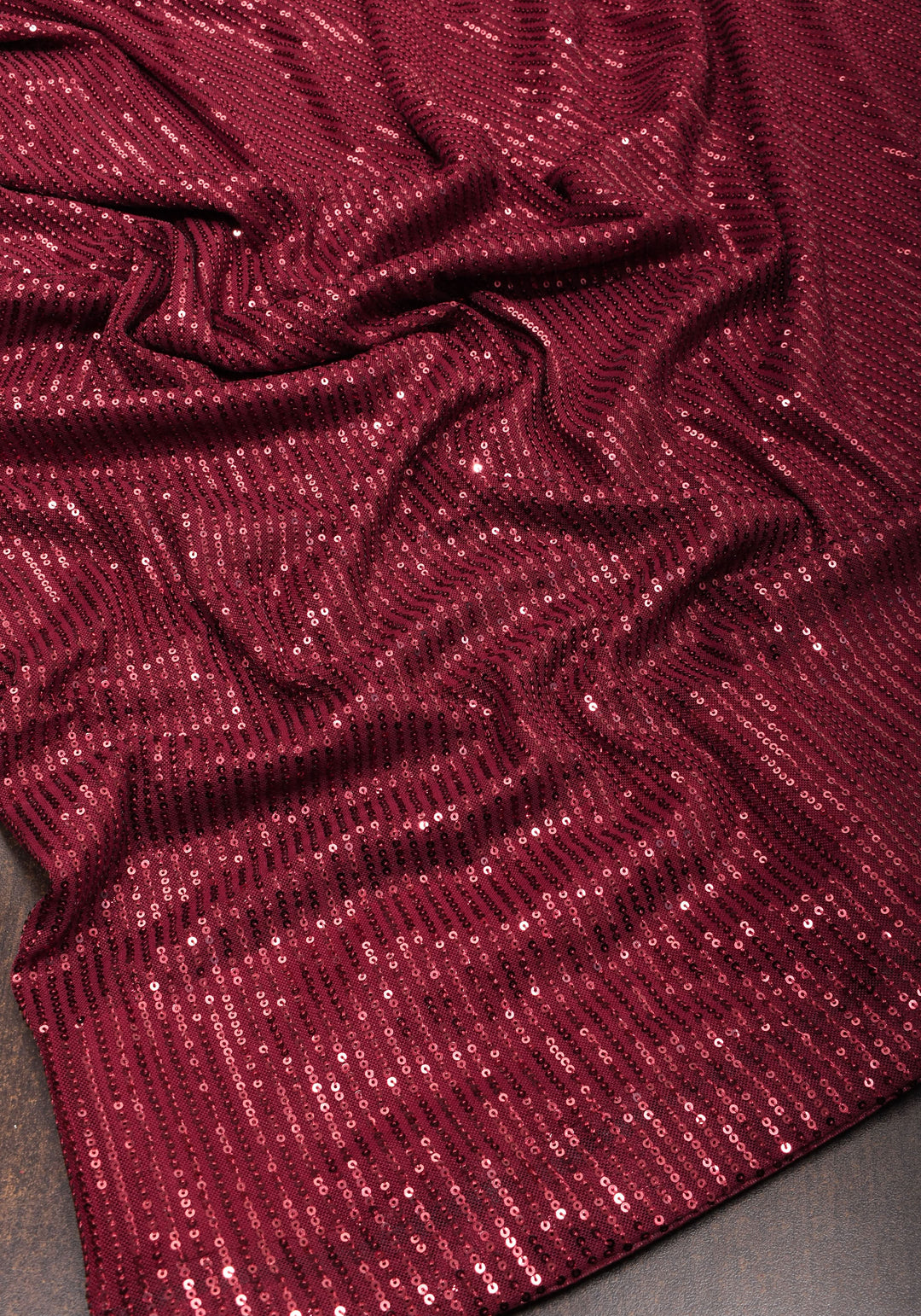 Maroonish Red Sequins Saree in net
