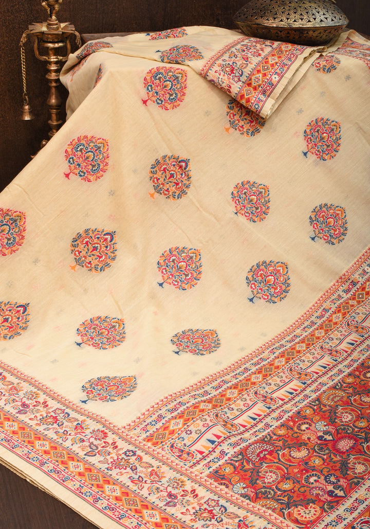 Cream and Red Rayon Saree with Floral Kani Design