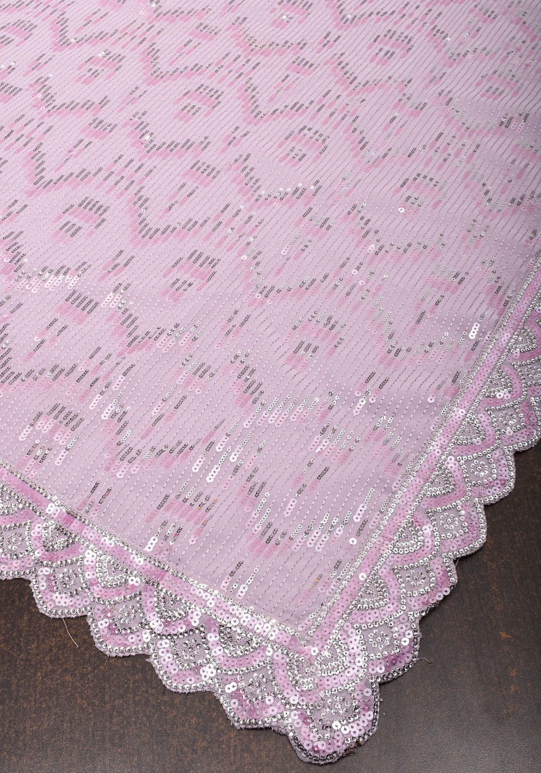 Full Sequins Embellished Georgette Saree in mauve with Scalloped border