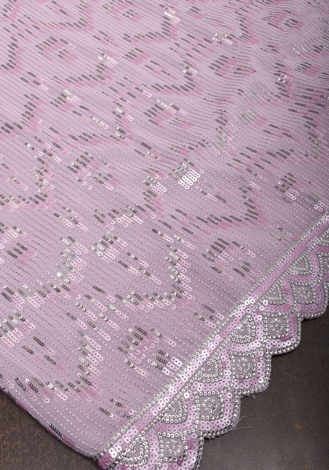Full Sequins Embellished Georgette Saree in mauve with Scalloped border