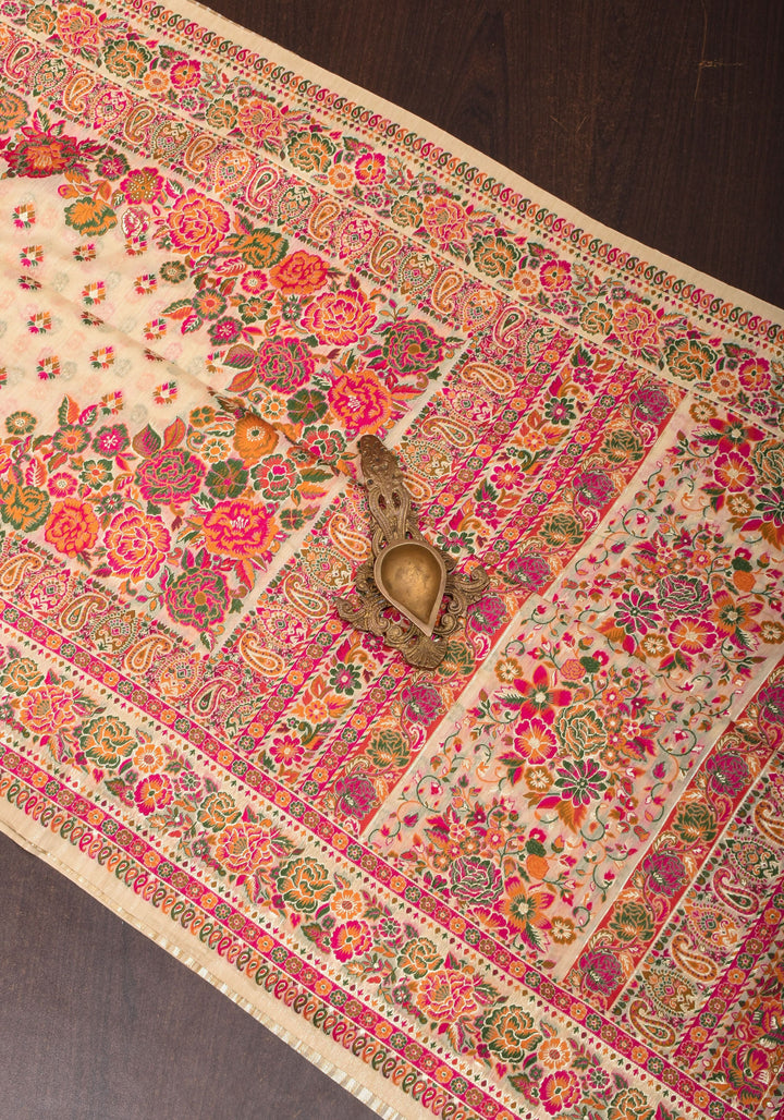Beige Rayon Saree in Kani Style with wide Floral Borders