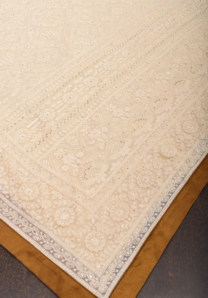 Ivory Georgette Saree with Self Embroidery and Amber Satin Trim