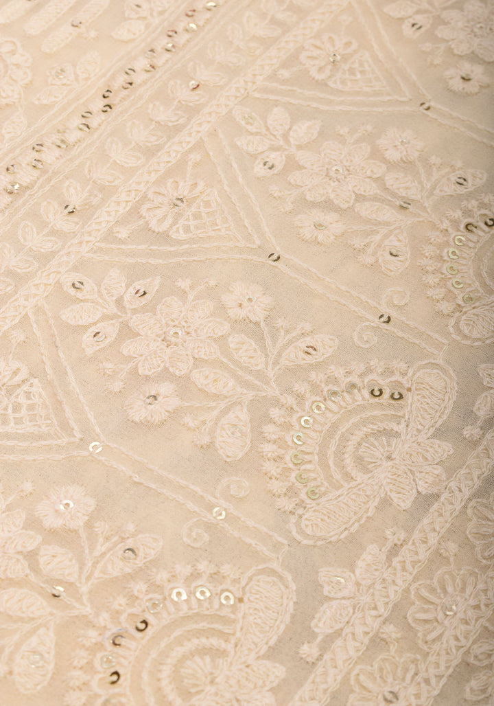 Ivory Georgette Saree with Self Embroidery and Amber Satin Trim