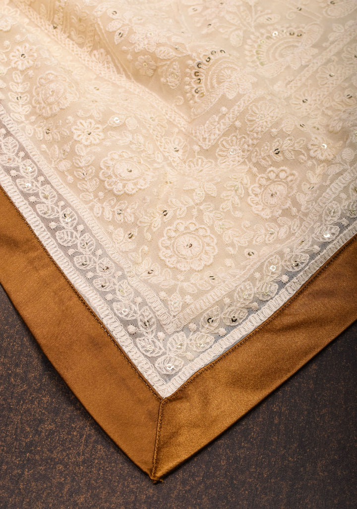Ivory Georgette Saree with Self Embroidery and Amber Satin Trim