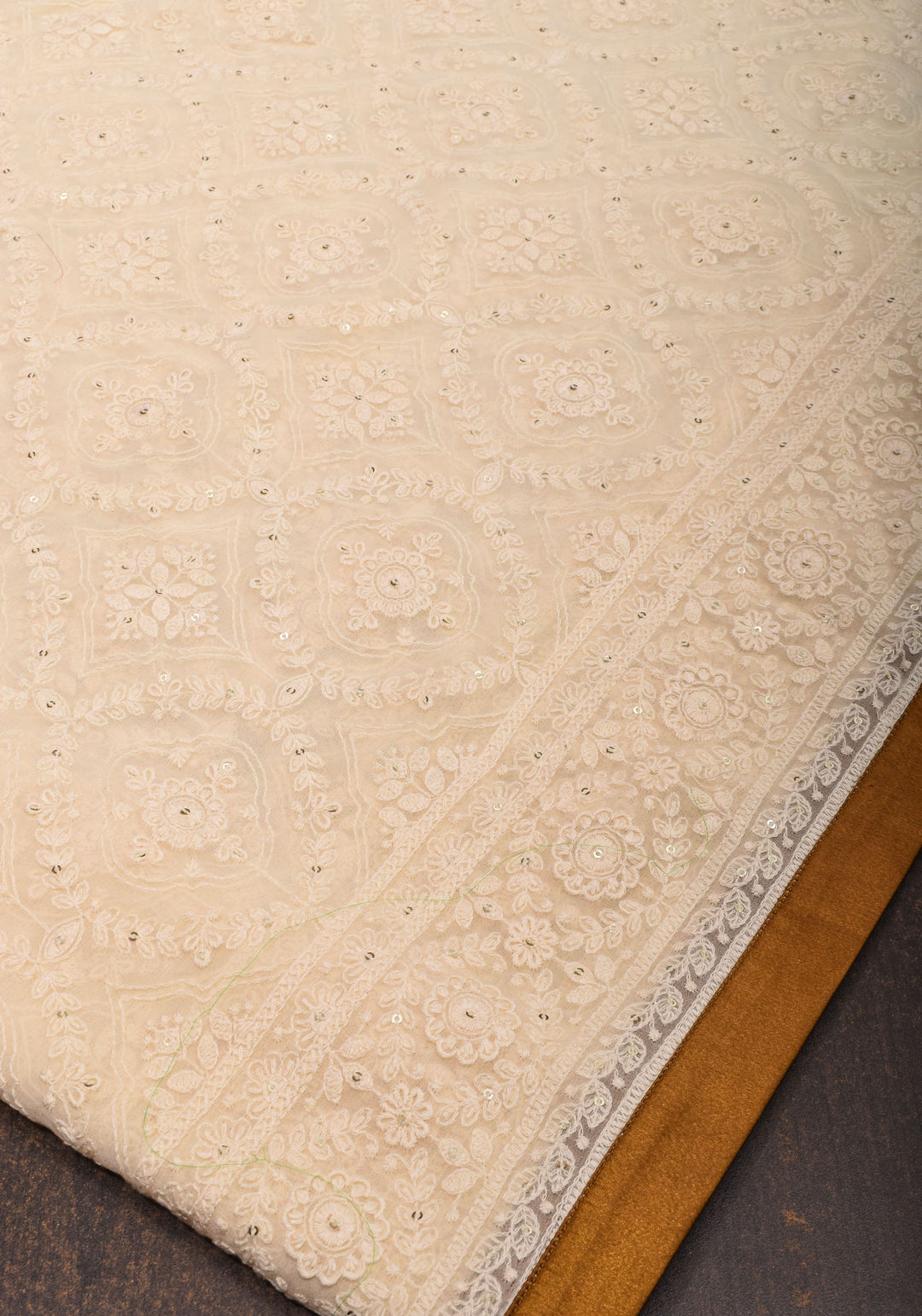 Ivory Georgette Saree with Self Embroidery and Amber Satin Trim